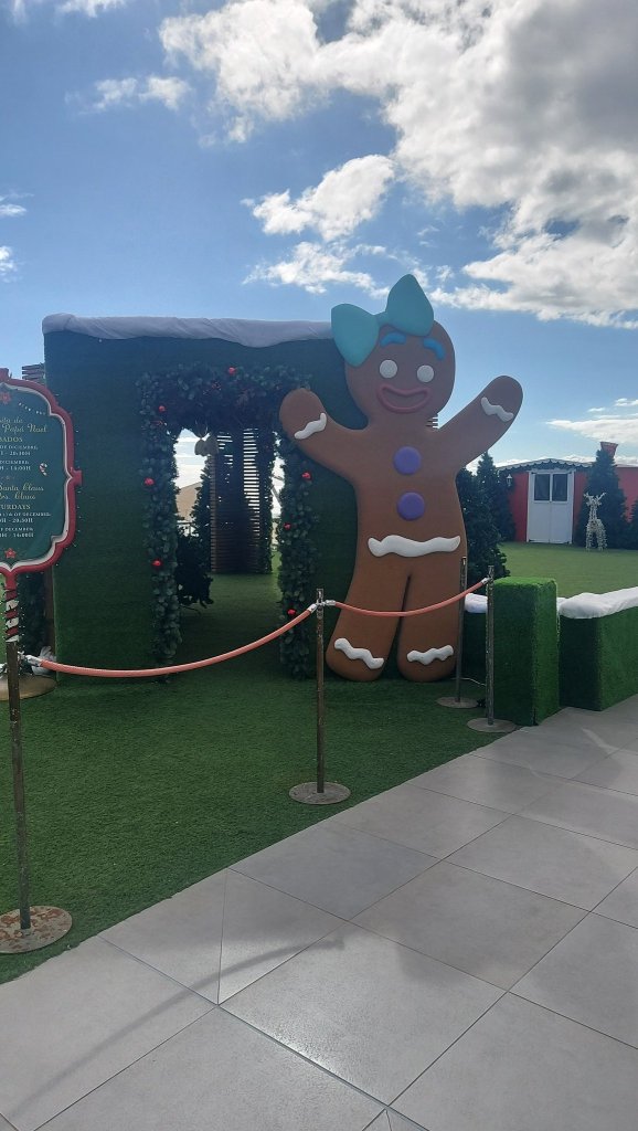 Run the Gingerbread man guards Santa's Grotto